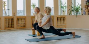 Senior Couples Doing Streching excercise to get healthy body