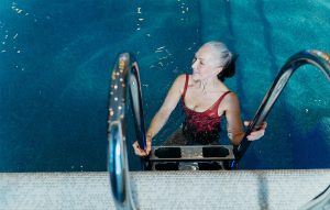 Senior on pool doing exercise is a great way to stay fit and healthy