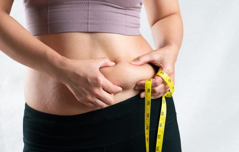 Measuring belly fat of stomach for seeing the results of your weight loss supplements